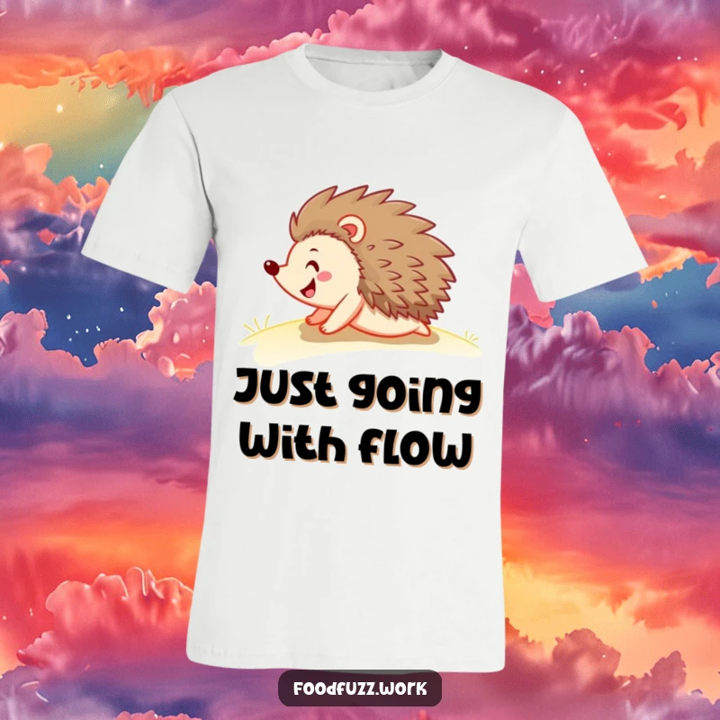 Funny hedgehog t-shirt depicting a joyful hedgehog playfully tumbling down a soft green slope, celebrating the fun of falling with glee.